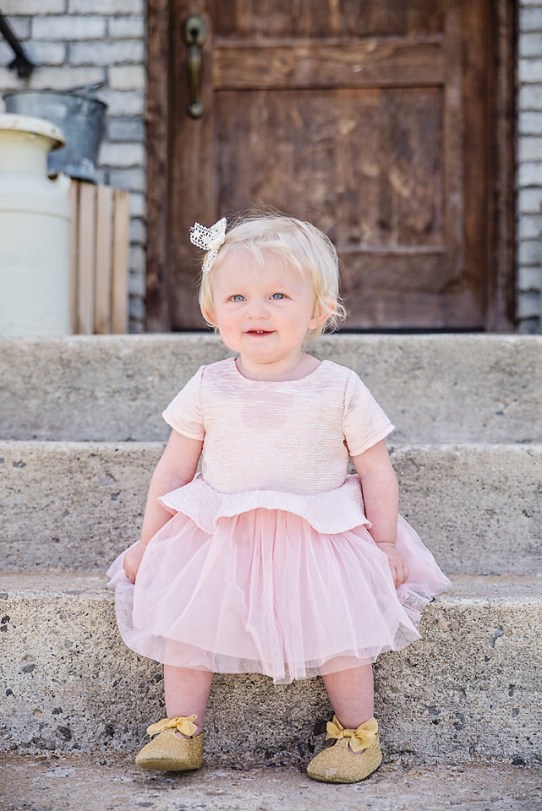 Easter Pictures smiling baby on step pink dress